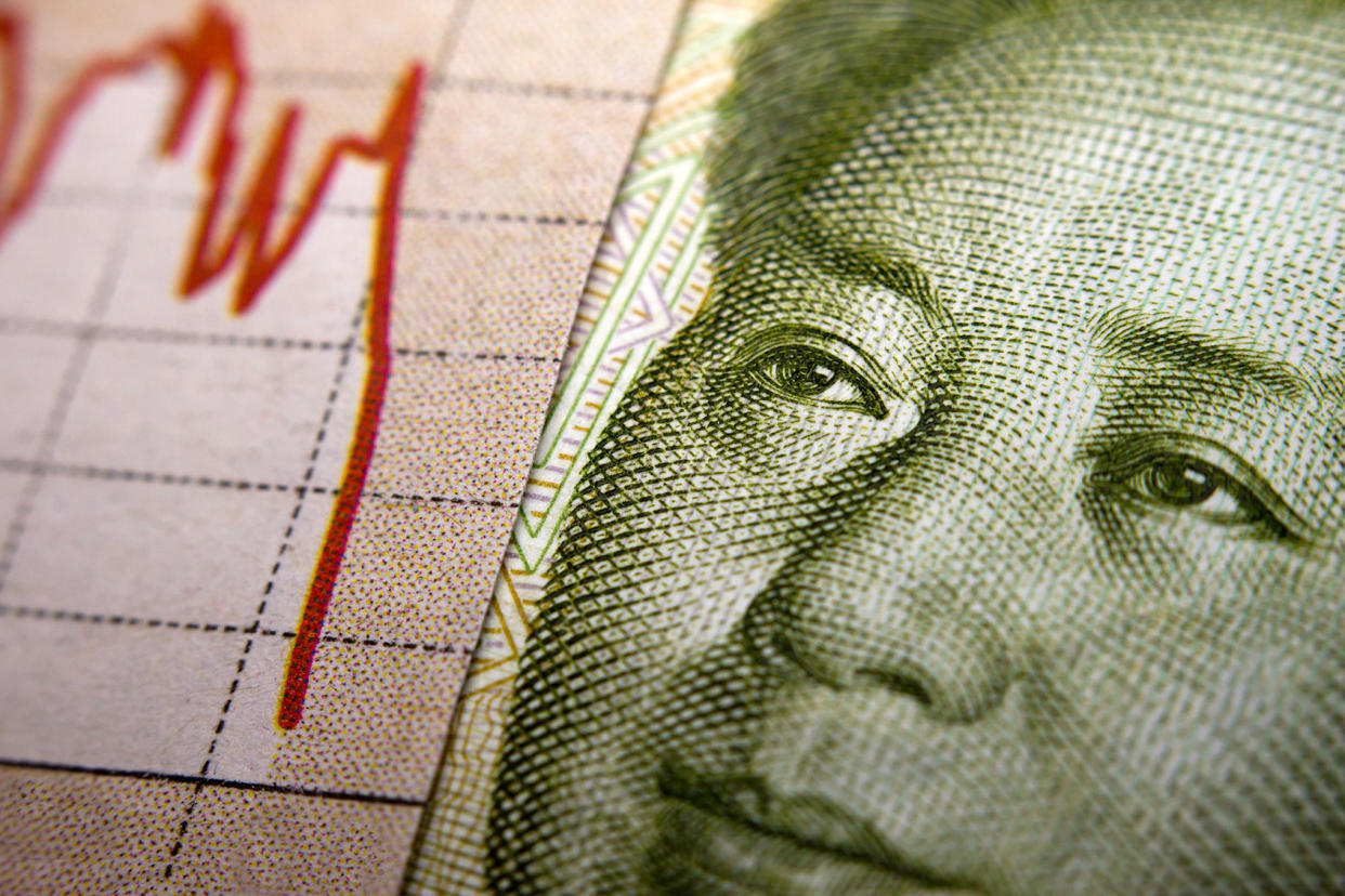 Stock Market Graph and Chinese banknote, closeup Getty Images/claffra