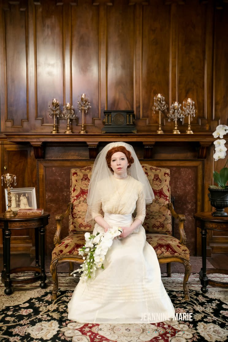 Bride poses in great-grandmother’s dress from 1910. (Photo: Jeannine Marie Photography)