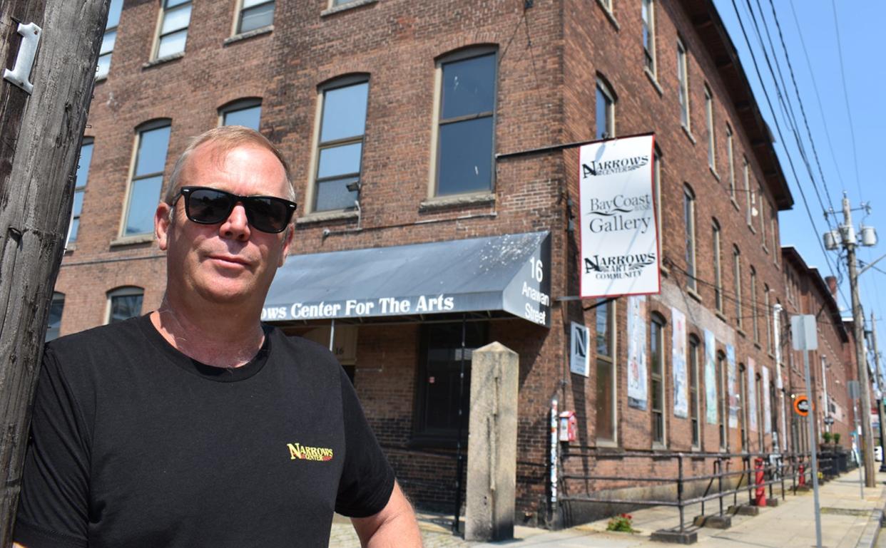 Patrick Norton stands outside the Narrows Center for the Arts in Fall River. The Narrows Center is one of the three biggest tourist draws in Fall River.