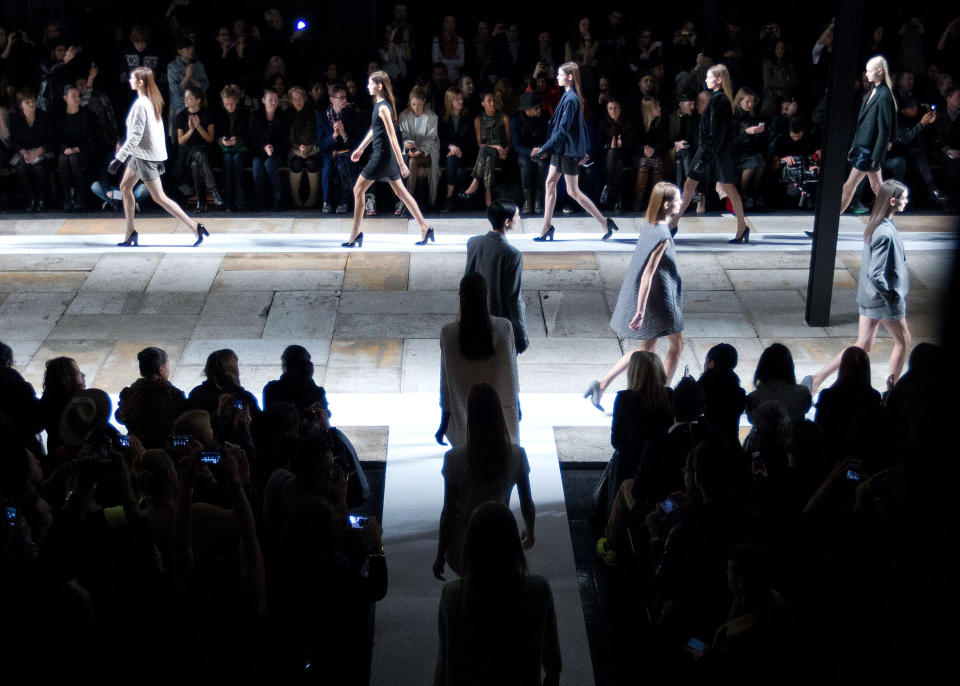 Models walk the runway at the Fall 2013 Theyskens’ Theory Runway Show, on Monday, February 11, 2013, in New York. (Photo by Dario Cantatore/Invision/AP)