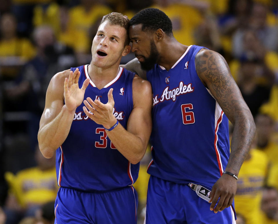 Los Angeles Clippers' Blake Griffin (32) celebrates with teammate DeAndre Jordan (6) after Griffin drew a fragrant foul during the second half in Game 3 of an opening-round NBA basketball playoff series against the Golden State Warriors on Thursday, April 24, 2014, in Oakland, Calif. Los Angeles won 98-96. (AP Photo/Marcio Jose Sanchez)