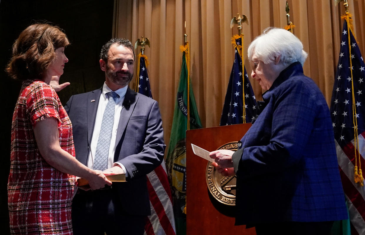 U.S. Treasury Secretary Janet Yellen conducts the ceremonial swearing-in of Internal Revenue Service (IRS) Commissioner Danny Werfelin, as his wife Beth stands at his side, in Washington, U.S,  April 4, 2023.  REUTERS/Kevin Lamarque