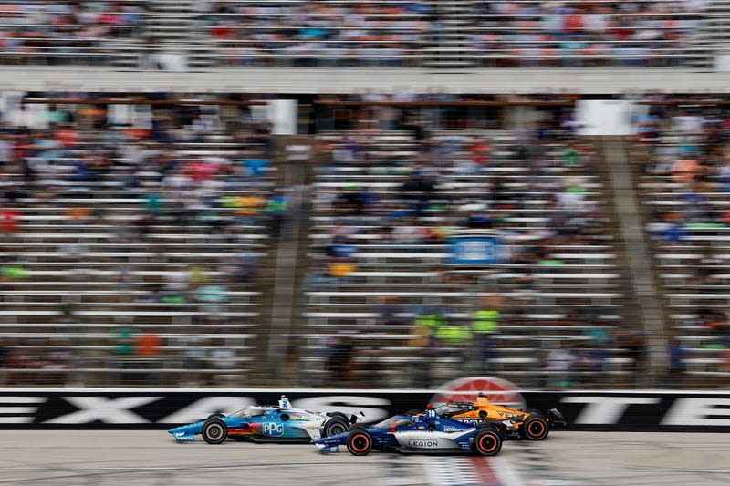 Josef Newarden, Alex Palou, and Pato O'Ward battle for the lead at Texas Motor Speedway's PPG 375. 