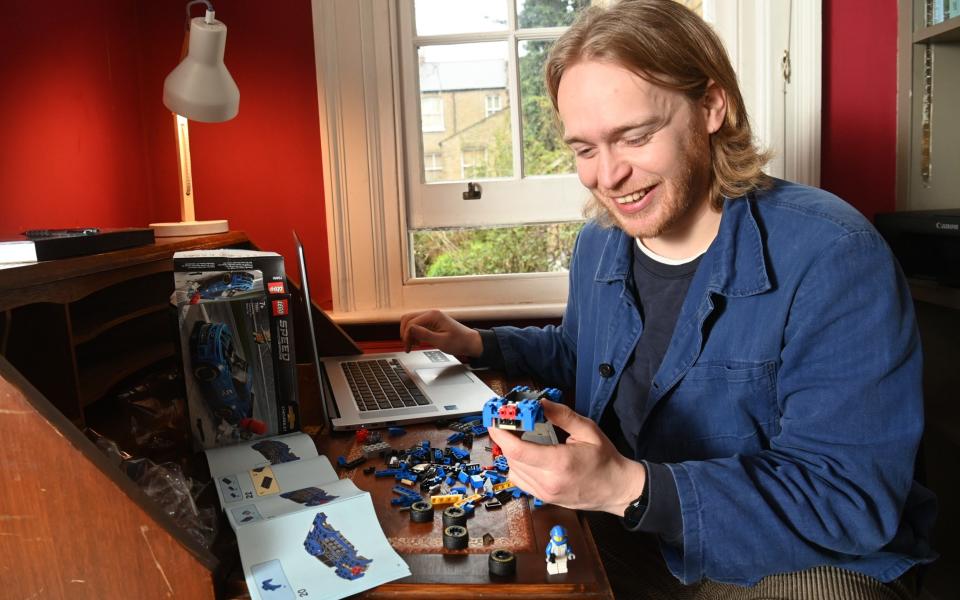Fun at any age: A person (not Danish) enjoying Lego - Paul Grover/The Telegraph