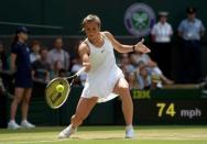 Britain Tennis - Wimbledon - All England Lawn Tennis & Croquet Club, Wimbledon, England - 3/7/16 Germany's Annika Beck in action against USA's Serena Williams REUTERS/Tony O'Brien