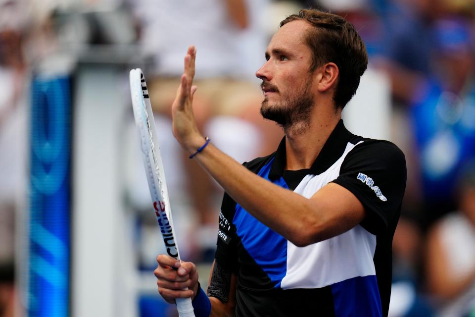 Daniil Medvedev thanks the fans after the quarterfinal match between Taylor Fritz (USA) and Daniil Medvedev at the Western & Southern Open at the Lindner Family Tennis Center in Mason, Ohio, on Friday, Aug. 19, 2022. Medvedev won the match 7-6, 6-3. 