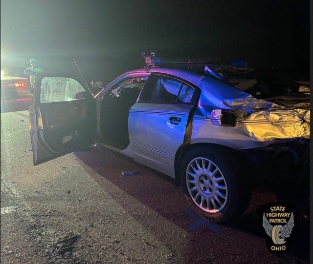 The Ohio State Highway Patrol reported a trooper was injured Monday when his vehicle was hit on the Ohio Turnpike in Sandusky County.