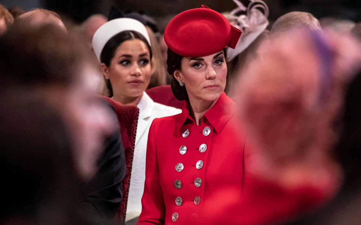 Duchess of Cambridge sits near the Duchess of Sussex as they attend the Westminster Abbey Commonwealth day service - Times Newspapers Ltd