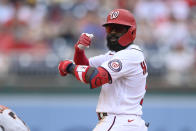 Washington Nationals' Josh Harrison gestures at second base after he hit a double during the fifth inning of a baseball game against the San Francisco Giants, Sunday, June 13, 2021, in Washington. (AP Photo/Nick Wass)