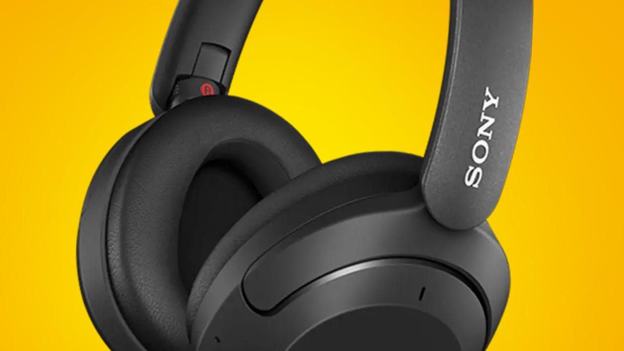  The Sony WH-XB910N headphones on an orange background. 