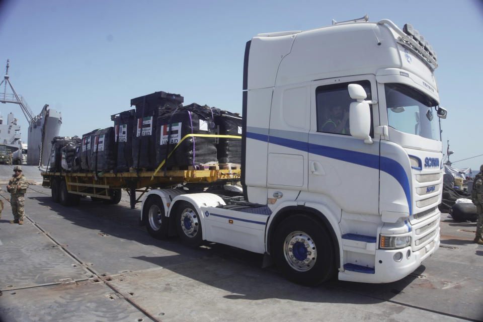 In this photo provided by U.S. Central Command, humanitarian aid arrives in Gaza, Saturday, June 8, 2024. (U.S. Central Command via AP)