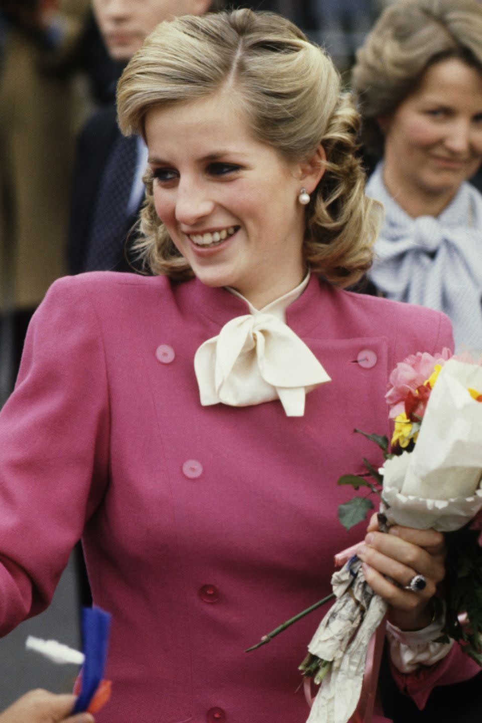 <p>With her longer hair, Diana tried bigger curls pinned back while visiting the Deaf, Blind and Rubella Council Family Centre. </p>