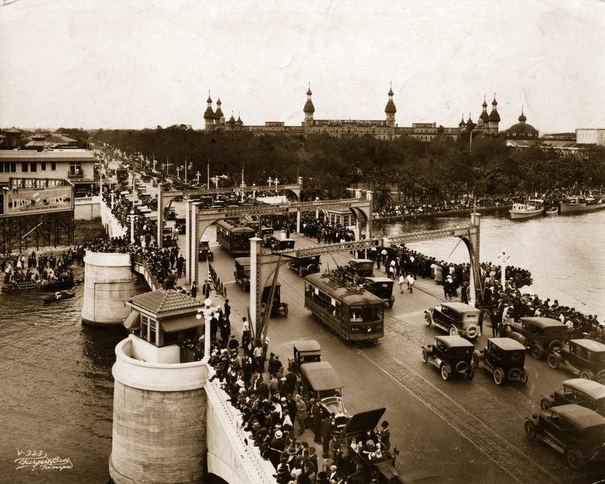 Tourists crowd the Lafayette Street Bridge in Tampa, Florida at the height of the tourist season