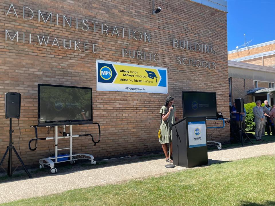 Aajanae Bowie, graduate of Obama School of Career and Technical Education, thanks her teachers and counselors for support at an event recognizing students for winning scholarships.