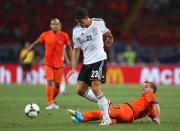 KHARKOV, UKRAINE - JUNE 13: Rafael van der Vaart of Netherlands tackles during the UEFA EURO 2012 group B match between Netherlands and Germany at Metalist Stadium on June 13, 2012 in Kharkov, Ukraine. (Photo by Joern Pollex/Getty Images)