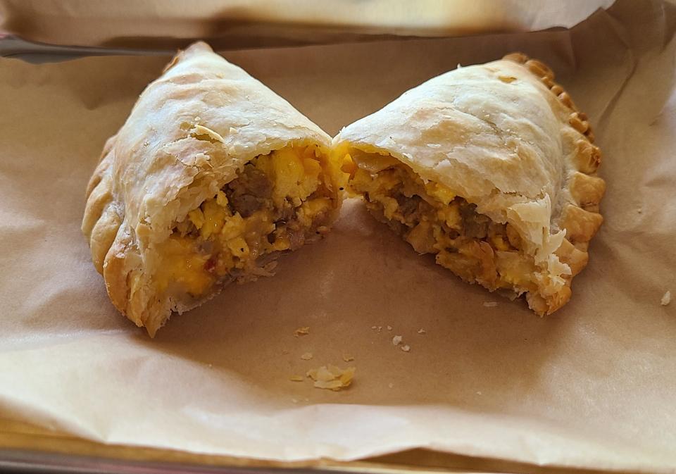 Sausage, egg and cheese breakfast empanada at Ori's Bakery & Cafe was devoured in 6 bites.