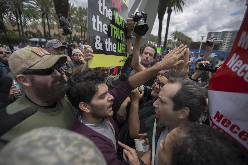 <p>Trump protesters and Trump supporters clash outside a campaign rally by presumptive GOP presidential candidate Donald Trump at the Anaheim Convention Center on May 25, 2016, in Anaheim, Calif. (David McNew/Getty Images) </p>