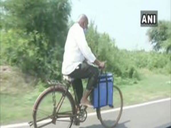 Dr Ramchandra Danekar on the way to a village in Chandrapur, Maharashtra on Friday. [Photo/ANI]