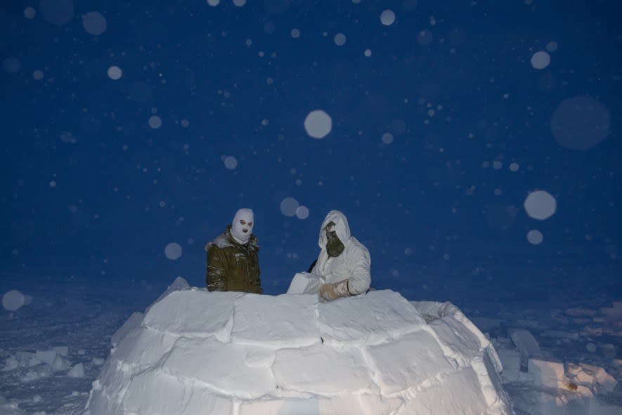 Canadian soldiers build an igloo during the high Arctic phase of their training to become Arctic operations advisors. In this part of the programme, they learn to travel, survive, and build shelters when they reach the high Arctic. (National Geographic/Pascal Maitre)