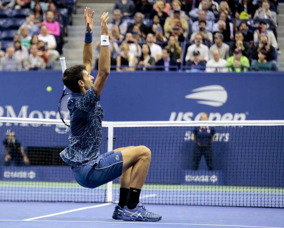 Novak Djokovic, of Serbia, celebrates after defeating Juan Martin del Potro, of Argentina, in the men's final of the U.S. Open tennis tournament, Sunday, Sept. 9, 2018, in New York. (AP Photo/Andres Kudacki)