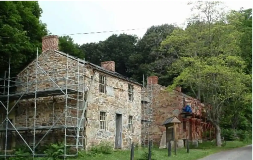 Main Street Coulsontown in Peach Bottom Township is shown. These Welsh quarrymen cottages were built about 1850 and are being restored. If you stop there, a detailed wayside marker tells about this village.