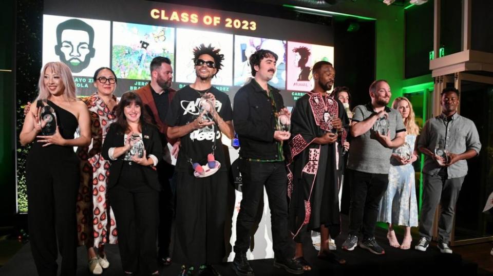 BURBANK, CALIFORNIA - JULY 18: (L-R) Jane Wu, Ramsey Naito, President of Animation, Paramount and Nickelodeon Animation, Abigail Nesbitt, Todd Gilchrist, Senior Editor, Focus, Variety, Jeron Braxton, Woodrow White, Ziki Nelson, Rachel Larsen, Owen Dennis, Carrie Hobson and Michael Yates pose with their awards at Variety 10 Animators to Watch presented by Nickelodeon at Nickelodeon Animation Studio on July 18, 2023. (Photo by Jon Kopaloff/Variety via Getty Images)