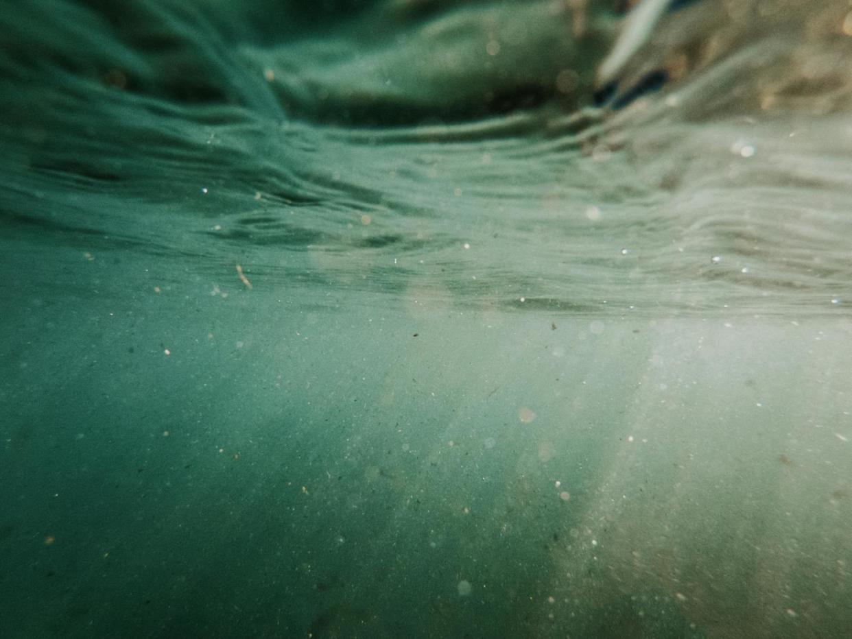 You can't see them, but there likely are nanoplastics in this Mediterranean seawater. <a href="https://www.gettyimages.com/detail/photo/water-close-up-royalty-free-image/1244657672" rel="nofollow noopener" target="_blank" data-ylk="slk:Lisa Schaetzle, Moment, via Getty Images;elm:context_link;itc:0;sec:content-canvas" class="link ">Lisa Schaetzle, Moment, via Getty Images</a>