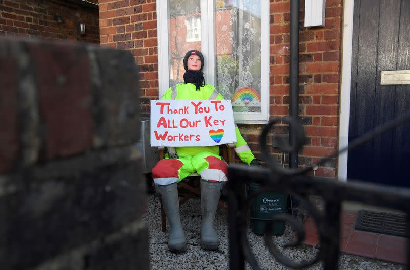 Scarecrows representing key workers lighten the daily lockdown walk, as the number of the coronavirus disease cases (COVID-19) grows around the world, in the village of Capel