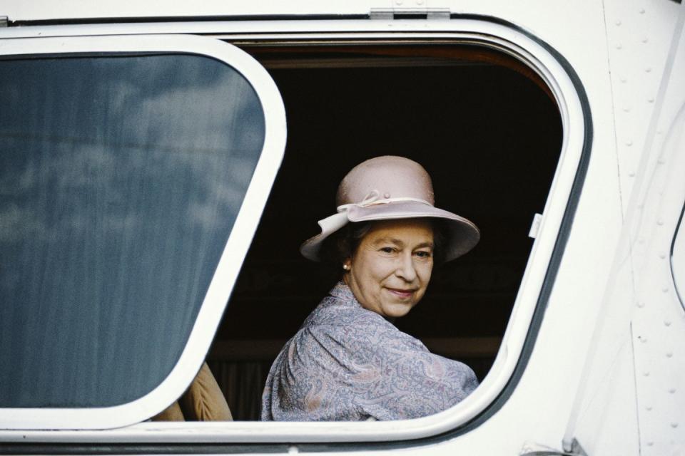 <p>Looking out a window during a royal trip to Acapulco, Mexico, she wears a purple ensemble.<br></p>