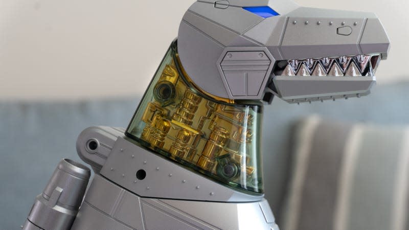 A close-up of the neck detailing on Robosen and Hasbro's Transformers Grimlock Auto-Converting Robot Flagship Collector’s Edition.