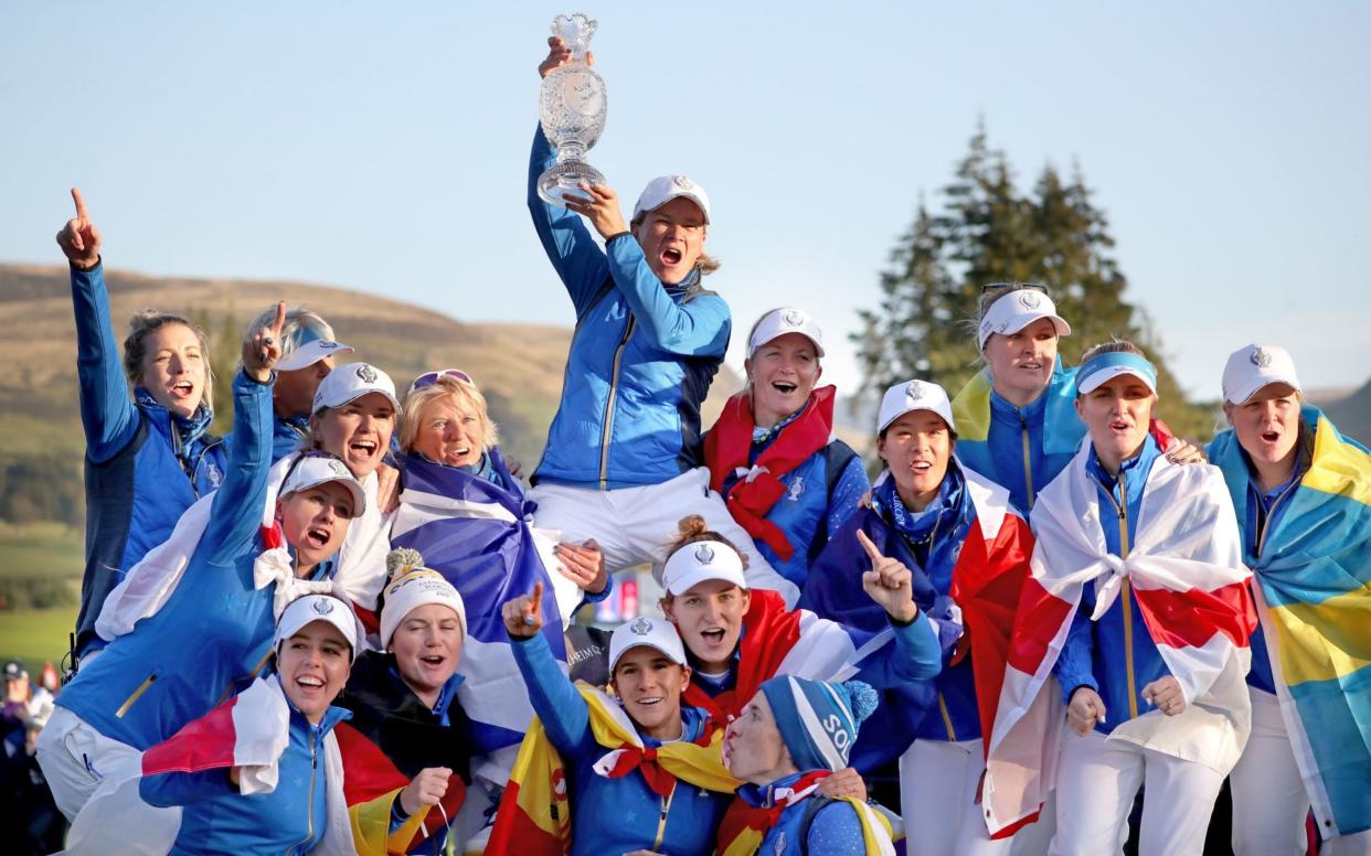 Catriona Matthew with her victorious Solheim Cup team - PA