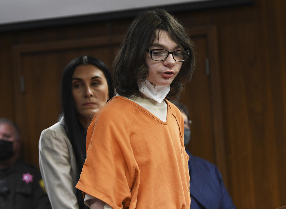 FILE - Ethan Crumbley answers "yes" to charges against him from assistant prosecutor during his pre-trial hearing at Oakland County Courthouse, Oct. 24, 2022, in Pontiac, Mich. Two former school board officials of Oxford Community Schools in Oxford, Mich., said Monday, Nov, 28, that policies and procedures that could have prevented a mass shooting that left four students dead at the Michigan high school last year were approved earlier but never implemented. (Clarence Tabb Jr./Detroit News via AP, File)