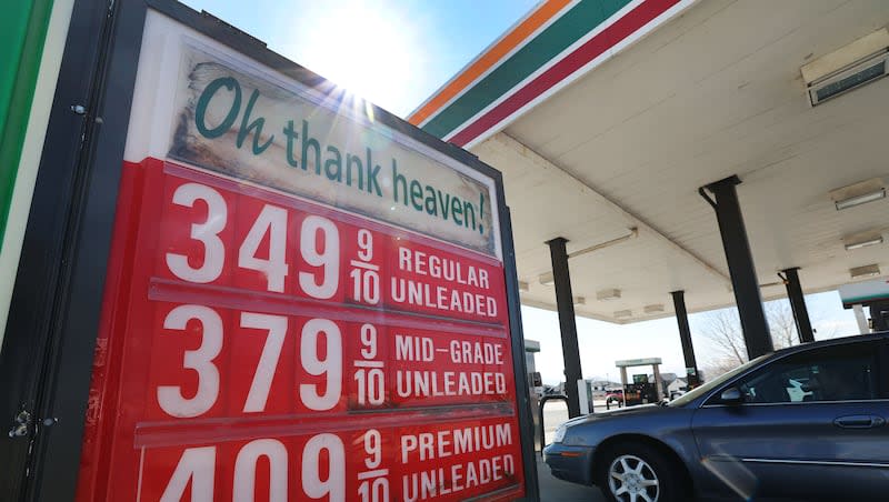 Gas prices are reflected at a pump in Sandy on Tuesday, March 19, 2024.