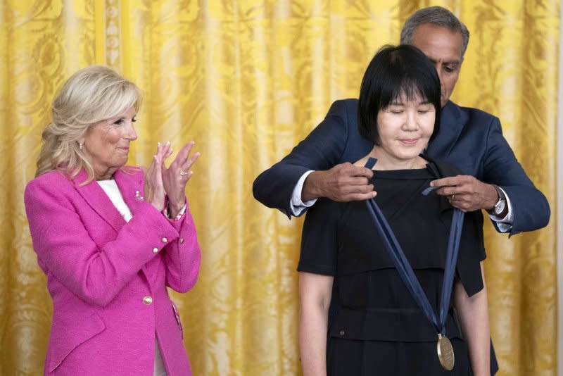 First lady Jill Biden applauds as Deputy Secretary of the U.S. State Department Richard Verma awards Suling Wang a medal during the 2023 International Medal of Arts ceremony Wednesday in the East Room of the White House in Washington, D.C. The award, selected by the U.S. State Department as part of the Art in Embassies program, honors those who have aided in promoting cultural diplomacy efforts worldwide. Photo by Bonnie Cash/UPI