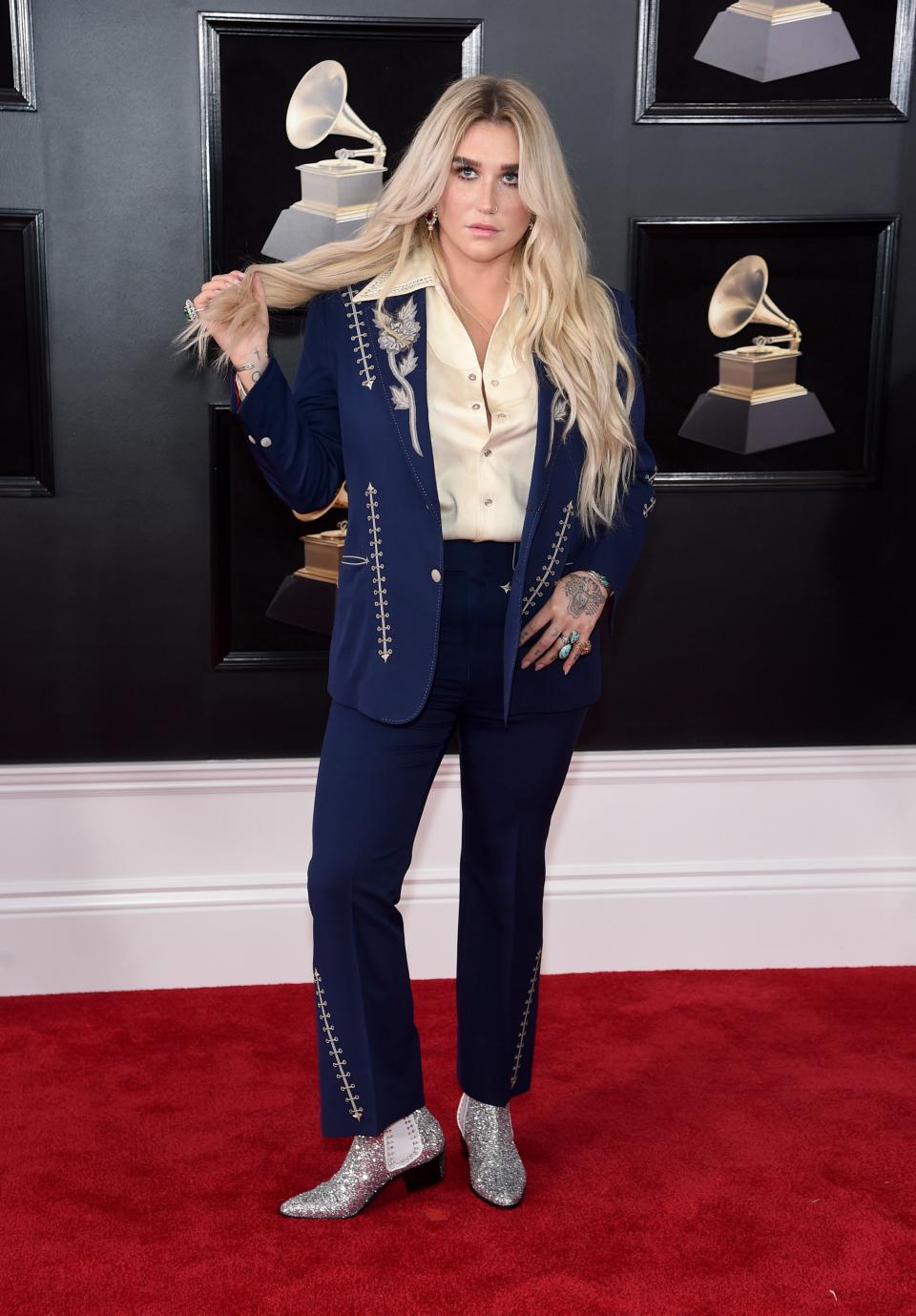 <h1 class="title">kesha white rose</h1><cite class="credit">Jamie McCarthy/Getty Images</cite>
