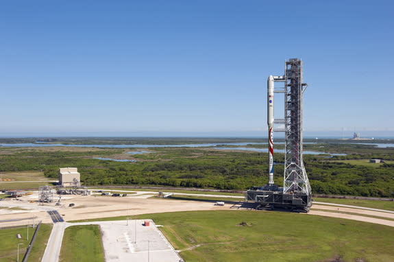 The new Liberty launch vehicle, which draws on parts of NASA's cancelled Ares I rocket and Europe's Ariane 5 rocket, will use existing infrastructure at Kennedy Space Center--including, possibly, the mobile launch platform shown in this illustr