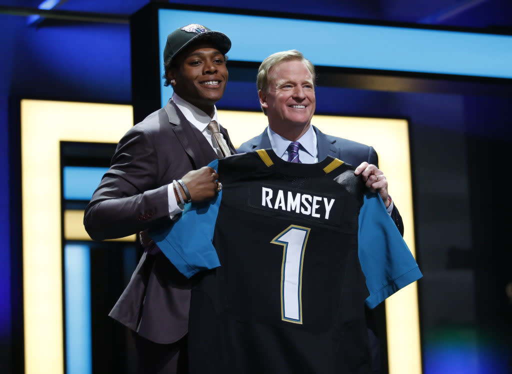 Apr 28, 2016; Chicago, IL, USA; Jalen Ramsey (Florida State) with NFL commissioner Roger Goodell after being selected by the Jacksonville Jaguars as the number five overall pick in the first round of the 2016 NFL Draft at Auditorium Theatre. Mandatory Credit: Kamil Krzaczynski-USA TODAY Sports
