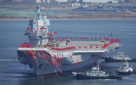 China's first domestically built aircraft carrier is seen during its launching ceremony in Dalian, Liaoning province, China, April 26, 2017. REUTERS/Stringer