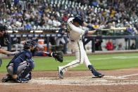 Milwaukee Brewers' Hunter Renfroe hits a double during the sixth inning of a baseball game against the Atlanta Braves Monday, May 16, 2022, in Milwaukee. (AP Photo/Morry Gash)