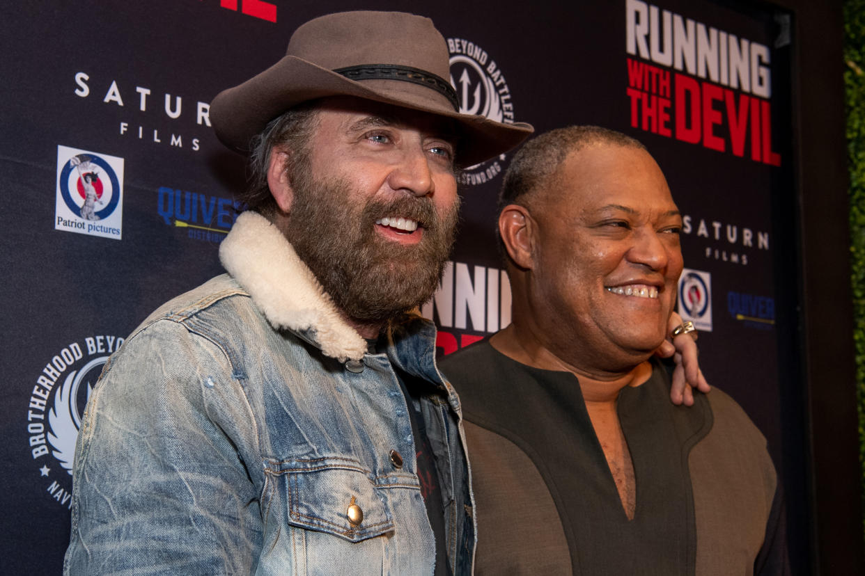 BEVERLY HILLS, CALIFORNIA - SEPTEMBER 16: Laurence Fishburne and Nicolas Cage attend the premiere of Quiver Distribution's 'Running with the Devil' at Writers Guild Theater on September 16, 2019 in Beverly Hills, California. (Photo by Emma McIntyre/Getty Images)