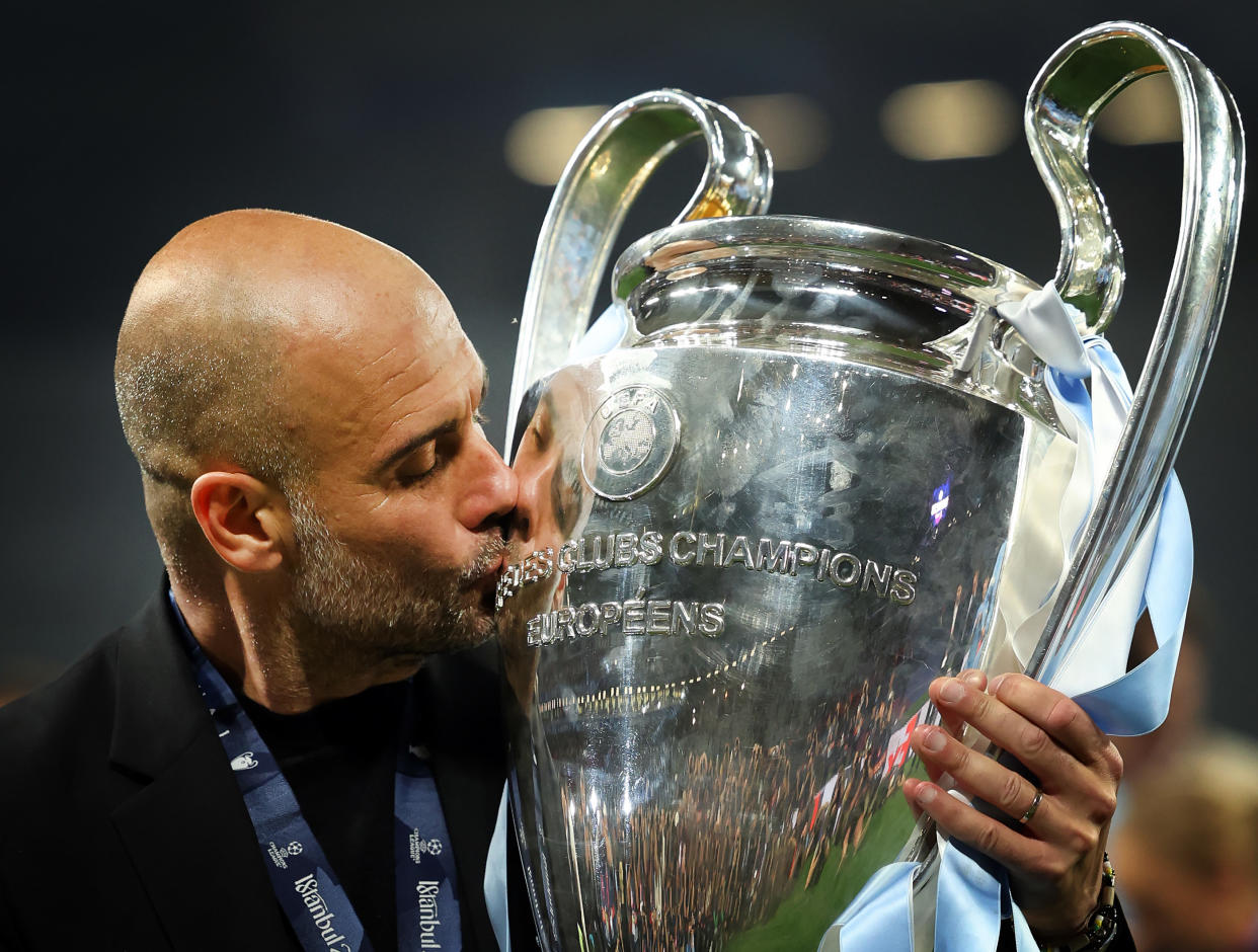 Manchester City manager Pep Guardiola kisses the European Cup after his side defeated Inter Milan in the Champions League final.