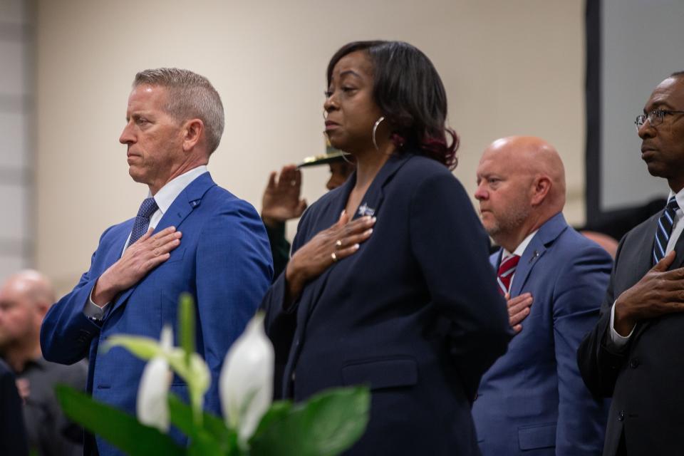 Speaker of the House Paul Renner, left, and Tallahassee City Commissioner Diane Williams-Cox stand for the Pledge of Allegiance during a service for Florida law enforcement officers who lost their lives in the line of duty held at the Donald L. Tucker Civic Center on Monday, April 29, 2024.