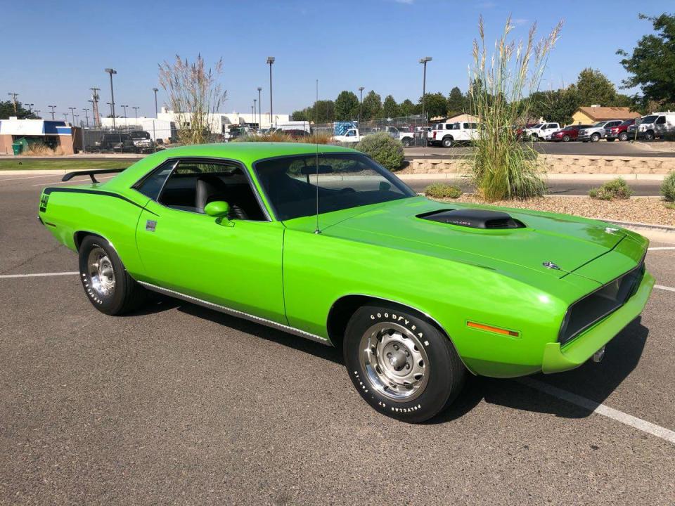 <img src="1970-cuda.jpg" alt="A 1970 Plymouth Cuda 440 Six-Pack for sale on Craigslist">