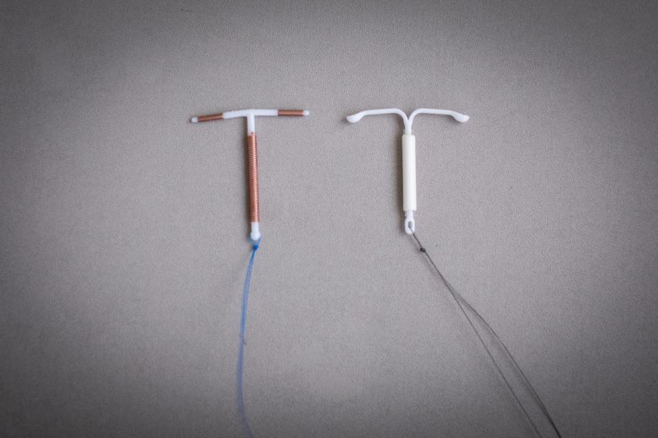 A copper IUD and a hormonal IUD are pictured in Vancouver, British Columbia on Thursday, May 18, 2023. 