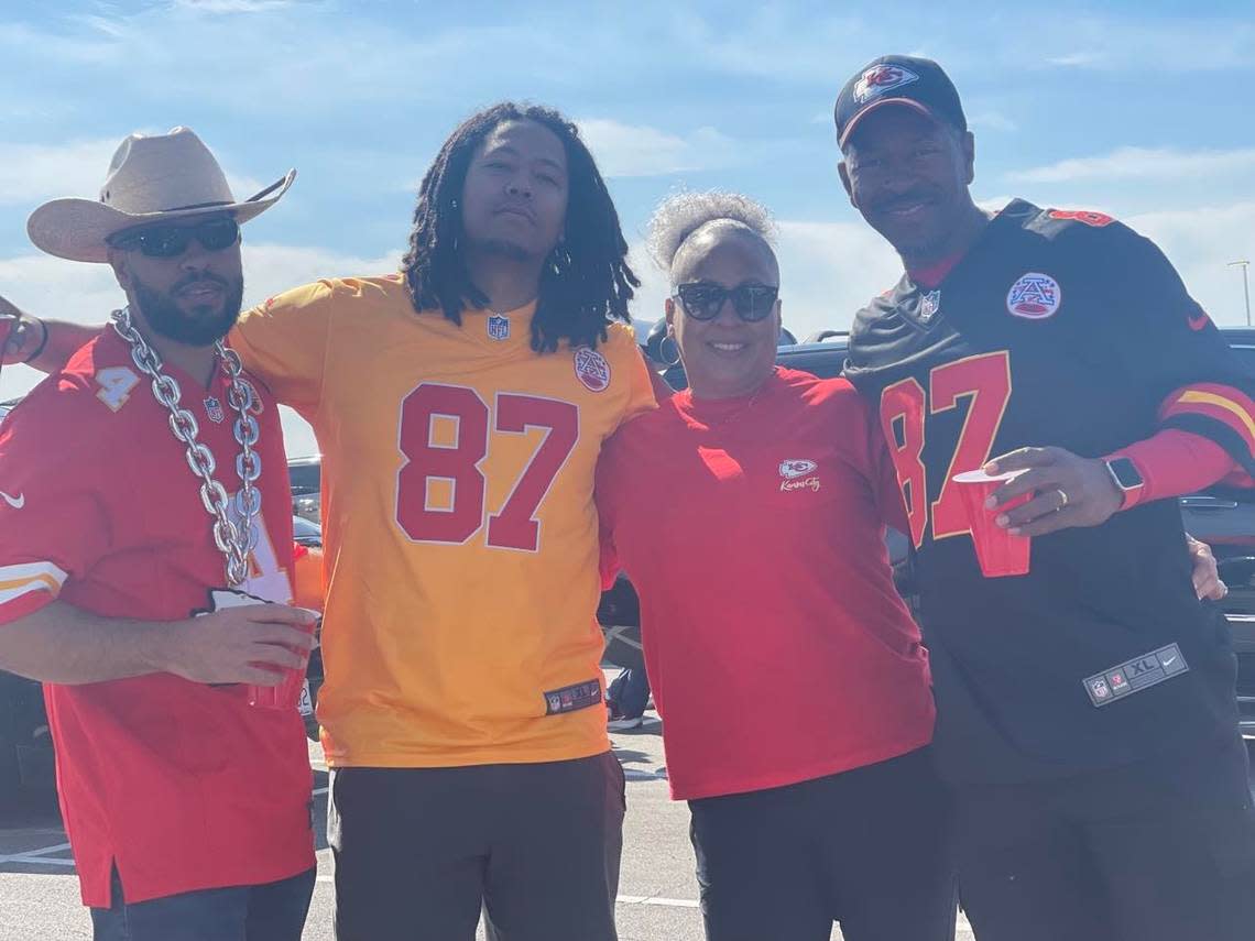 Anita and Tim Paige, right, with their children, Tim. Jr and Christian, at their tailgate. The kids usually fly in to join their parents for every home opener.