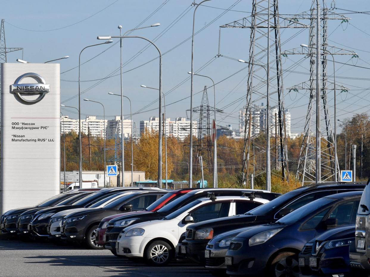 Cars are seen at a parking lot of a Nissan factory on the outskirts of Saint Petersburg on October 11, 2022