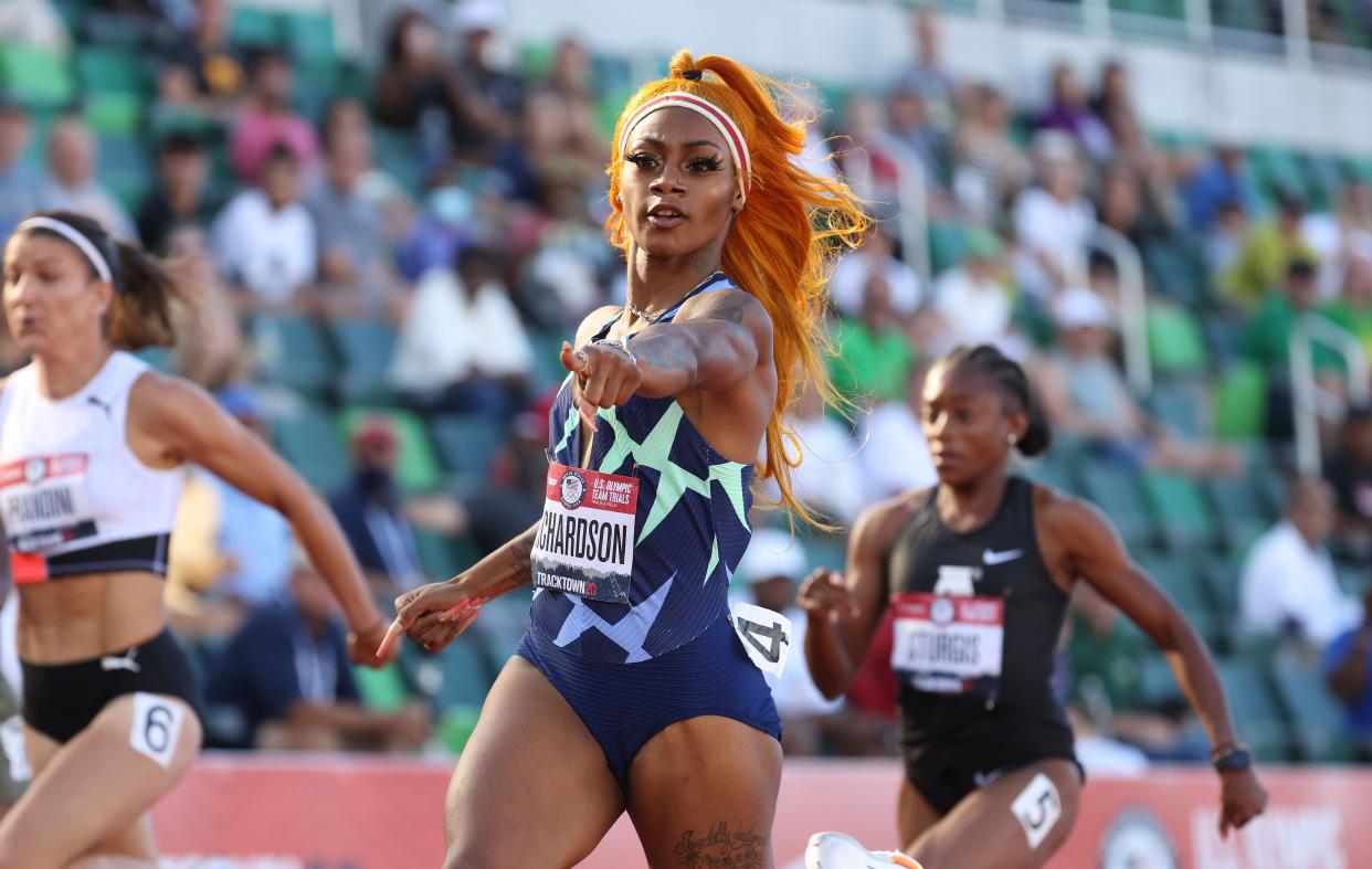 EUGENE, OR - JUNE 19:  Sha'Carri Richardson competes in the Women's 100 Meter on day 2 of the 2020 U.S. Olympic Track & Field Team Trials at Hayward Field on June 19, 2021 in Eugene, Oregon. (Photo by Andy Lyons/Getty Images)