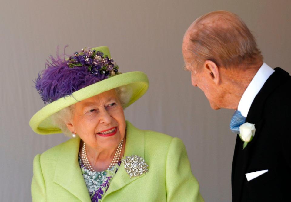 The Queen wearing the Queen Mary pearl and diamond Richmond brooch at the wedding of her grandson, Prince Harry, and Meghan Markle in May 2018 - AFP PHOTO / POOL / Alastair Grant