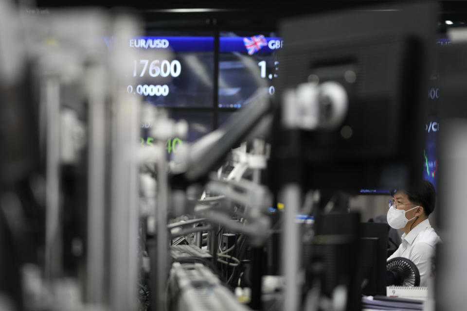 A currency trader watches computer monitors at a foreign exchange dealing room in Seoul, South Korea, Friday, Sept. 17, 2021. Asian shares were mixed on Friday after a hodge-podge of economic data led Wall Street to close mostly lower. (AP Photo/Lee Jin-man)