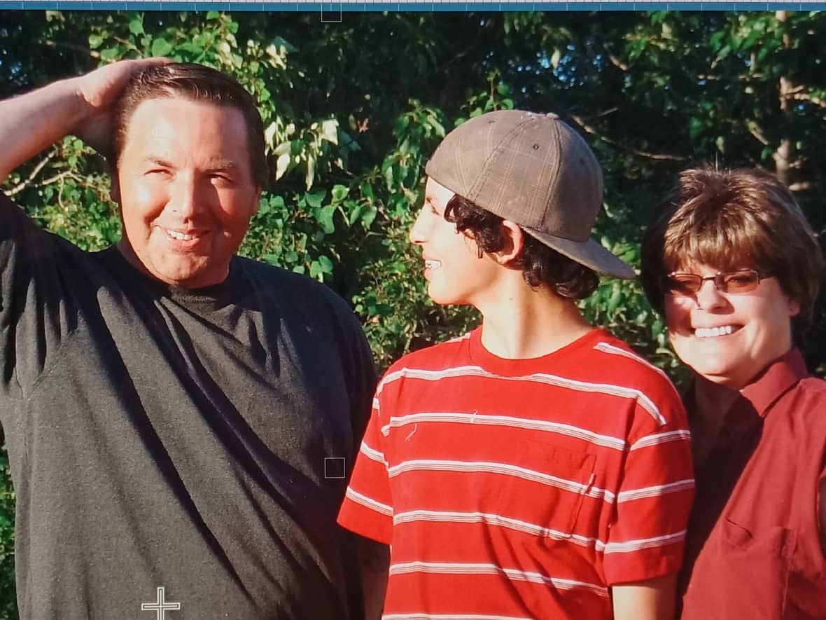 Wally and Lori Schumann with their son, CJ.   (Submitted by Wally Schumann - image credit)